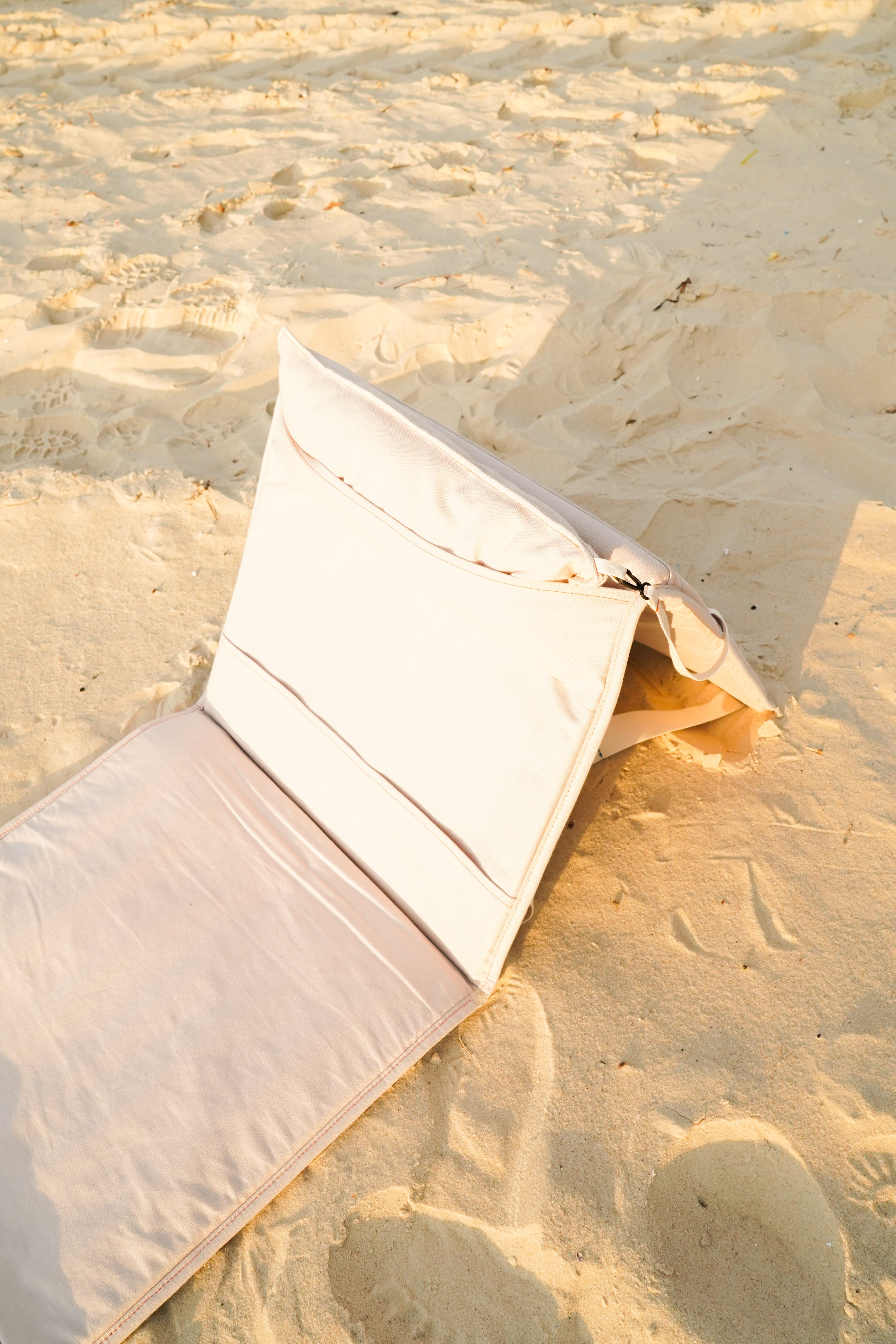 Le Nomad - Transat pliable blanc cassé